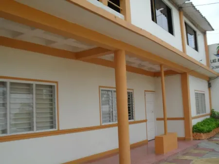 Casa Hotel Las Antillas Отели в г. Толу