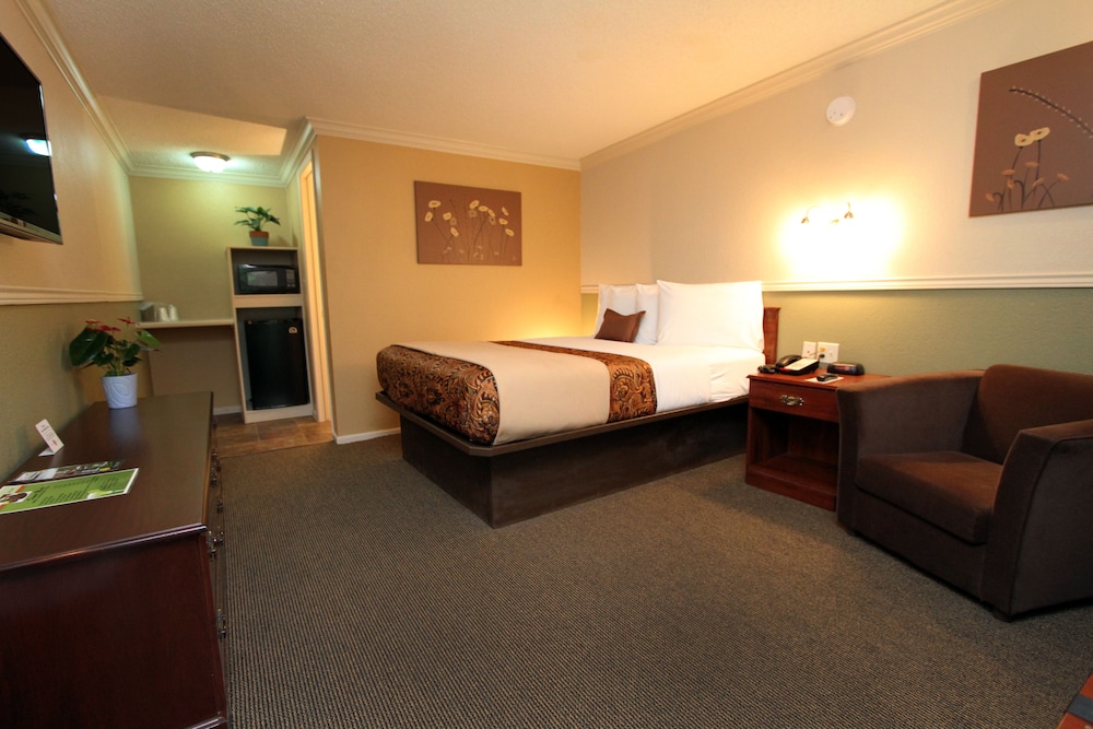 Family Garden Inn & Suites