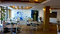 Hotel Corona Plaza Hôtels à : San Antonio del Mar
