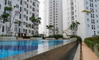 2 Bedrooms at Bassura City Apartment with Mall Access by Travelio