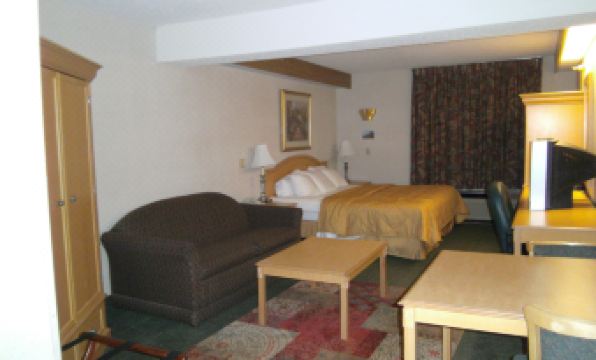 Pleasant Stay Inn & Suites - Housity