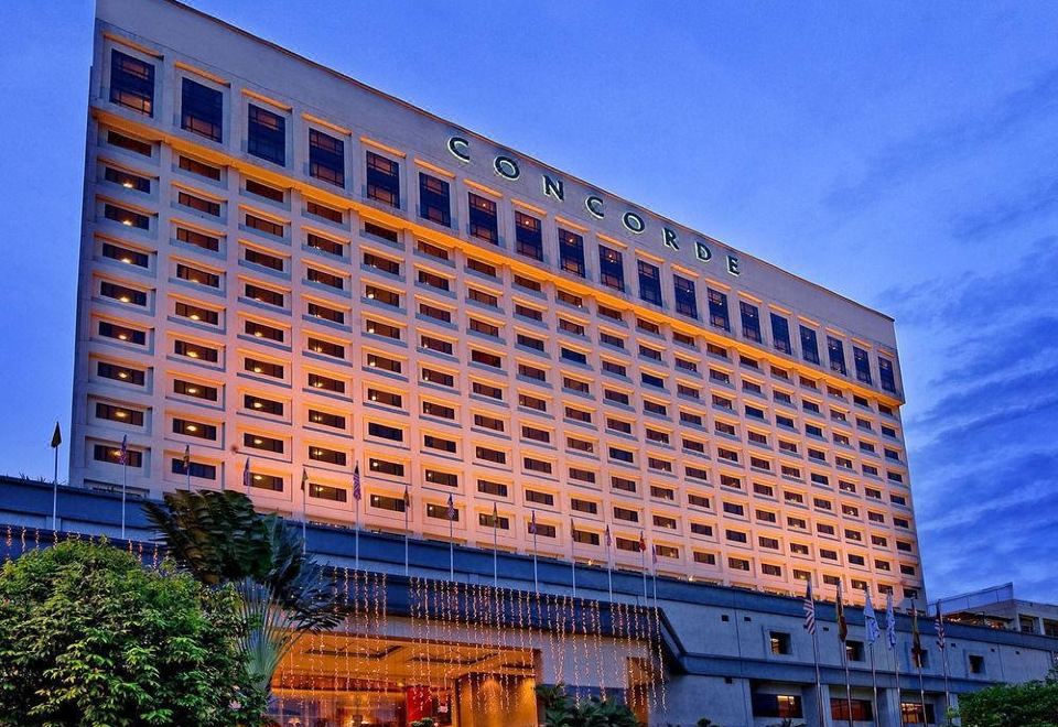 "a large , modern hotel building with a well - lit exterior and a sign reading "" concorde "" on the front" at Concorde Hotel Shah Alam