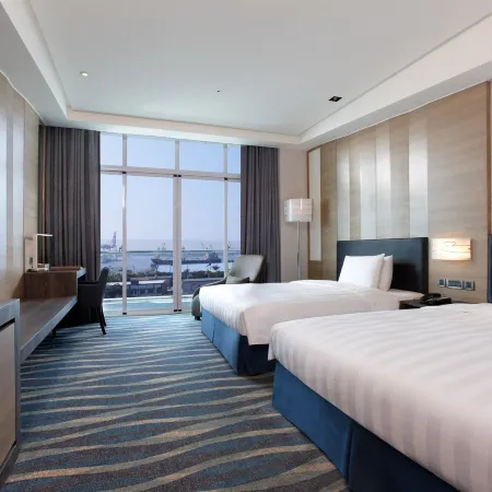 City Suites - Kaohsiung Chenai Отели рядом с достопримечательностью «Прибрежный парк Цицзинь»