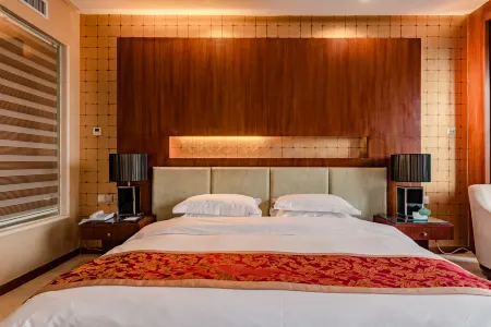 Bei Long Garden Hotel Отели рядом с достопримечательностью «Qingzhou Songcheng»