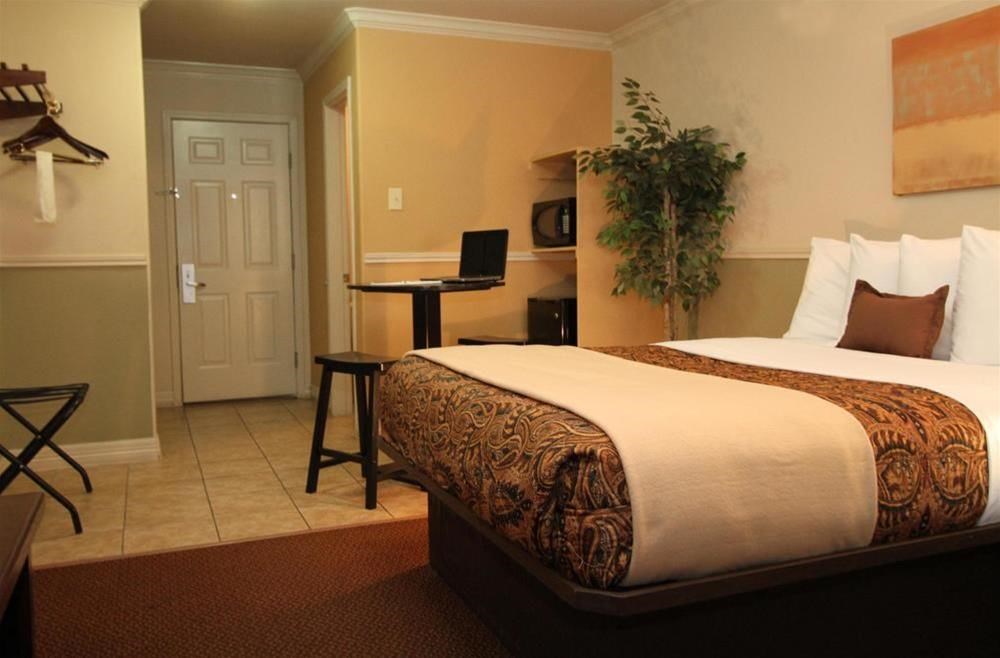 Family Garden Inn & Suites