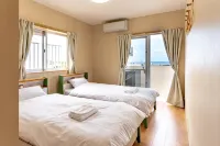The Villas Waiting Room Hotels in Мотобу