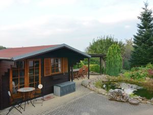 Apartment in the Harz With a log Cabin, Pond and Covered Seating Area