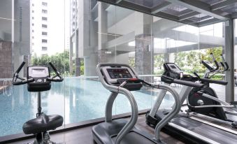 Guests have access to a gym with large windows that overlook the pool, as well as other outdoor exercise equipment at V Hotel Lavender