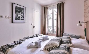 Family Apartment in Buttes Chaumont