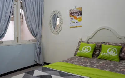 Homey Homestay Syariah Hotels in Lowokwaru Subdistrict