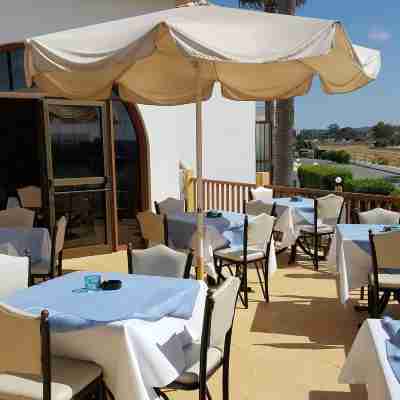 Cosmelenia Hotel Apartments Dining/Meeting Rooms