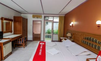 Nida Rooms Pasar Pekanbaru Bawah Samratulangi at Hotel Sri Indrayani
