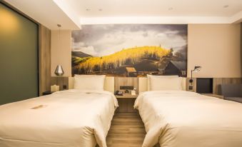 a hotel room with two beds , a nightstand between them , and a large mural on the wall at Atour Hotel