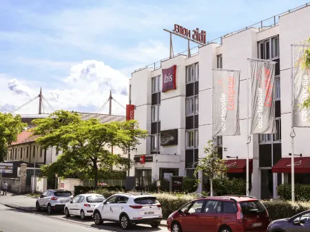 Ibis Saint-Denis Stade Ouest Отели рядом с достопримечательностью «Groupe AFNOR»