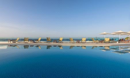 Cavo Orient Beach Hotel & Suites - Housity
