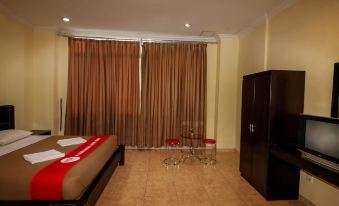 Nida Rooms Tampan SM Amin at Parma City Hotel