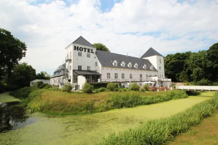 Vraa Slotshotel Отели в г. Tylstrup