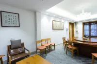 Youjian Xiaoyuan Hot Spring Hostel - ที่มีบาร์