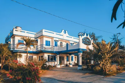 Club Monet Beachfront Resort by Cocotel Hotels near Iglesia Ni Cristo