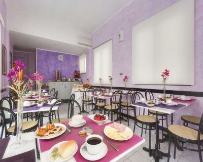 レストラン コンフォート ホテル ヨーロッパ ジェノヴァ シティ センター ジェノヴァの写真