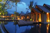 Trou aux Biches Beachcomber Golf Resort & Spa Hôtels à proximité de : Notre-Dame Auxiliatrice de Cap Malheureux