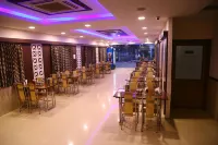 Hotel Varshan International Hotels near Chennimalai Murugan Temple
