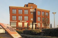 Hotel Rauw aan de Kade Hotel berhampiran Het Roode Hert