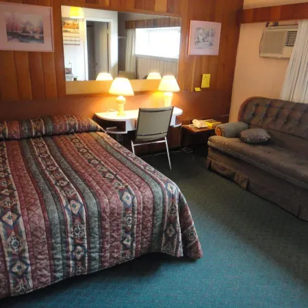 Airport Inn Отели в г. Квеснел