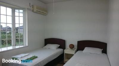 Twin Room with Extra Bed and Shared Bath and Toilet