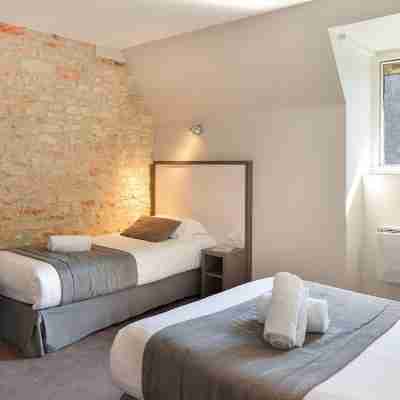 Logis Hôtel le Puits Doré Rooms