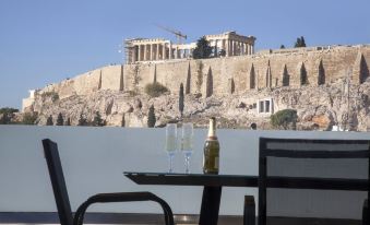 Luxury Penthouse Touching the Acropolis by Ghh