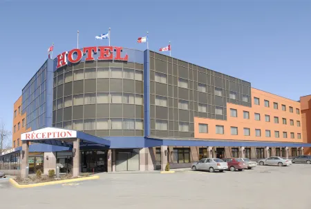 Hotel Ambassadeur et Suites Отели рядом с достопримечательностью «Pourvoirie du Lac Beauport»