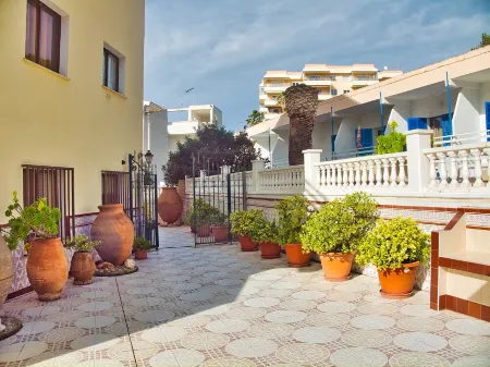 Bon Aire Apartamentos Отели в г. Пагера