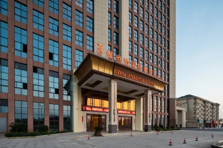 Vienna International Hotel (Wuyi Hushan) Отели в г. Уи