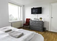 Grótta Northern Lights Apartment & Rooms فنادق في Seltjarnarnes