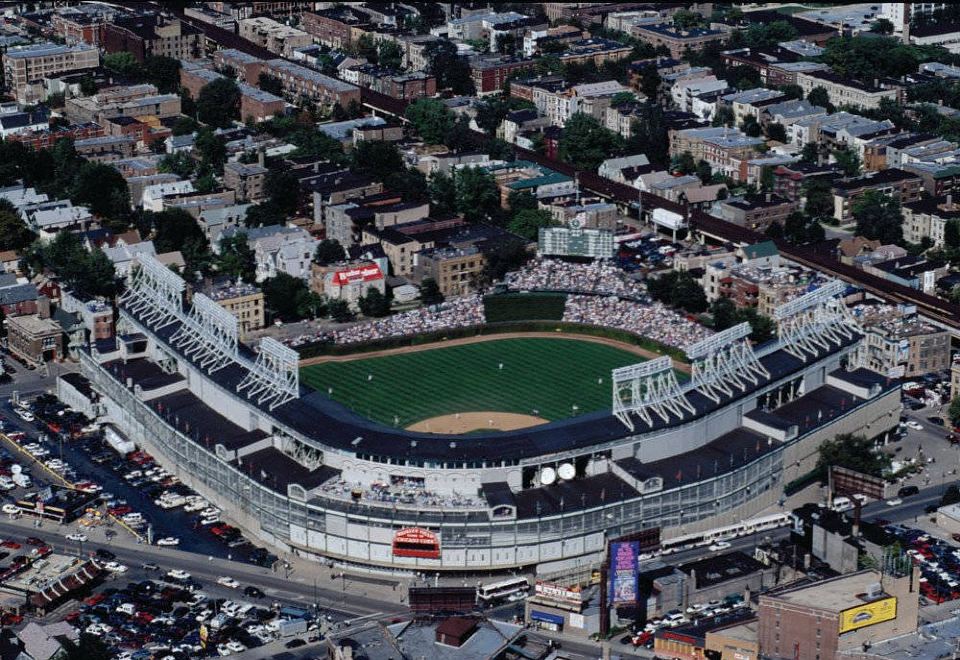 an aerial view of a large stadium with a grassy field and city buildings surrounding it at Courtyard Chicago Wood Dale / Itasca