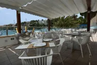 Portodrach Aparthotel & Suites فنادق في Cala Mendia