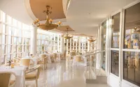 Golden Tulip Dar ES Salaam فنادق في دار السلام