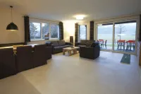 Ski & Golf Suites Zell am See by Alpin Rentals - Incl Summercard فنادق في Bruck an der GroBglocknerstraBe