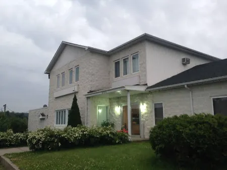 Motel Econonuit Отели в г. Шербрук