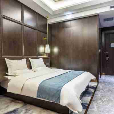Qiqihar Yifeng Business Hotel (Jianhua Hospital) Rooms