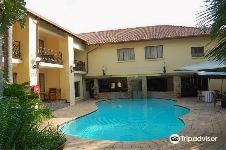 Aanmani Rose Guesthouse Отели в г. Цване