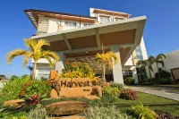The Harvest Hotel Managed by HII Hotels near San Vicente Catholic Chapel