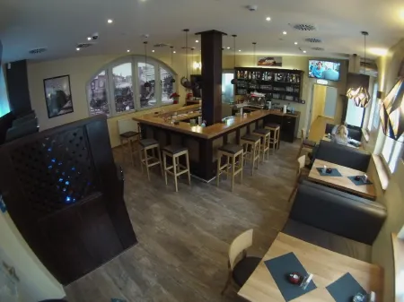 Ariston Отели в г. Зиндельфинген