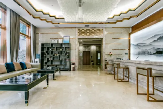 chongqing zhangzheng holiday hotel Отели рядом с достопримечательностью «Nantong Mining Industry Company Workers Culture & Sport Center»