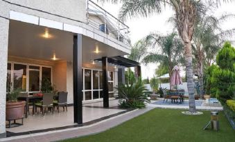 Cycad Palm Boutique Guest House