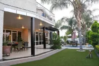 Cycad Palm Boutique Guest House