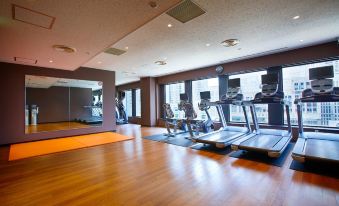 There is a gym on the top floor with treadmills and large windows at Keio Plaza Hotel Tokyo