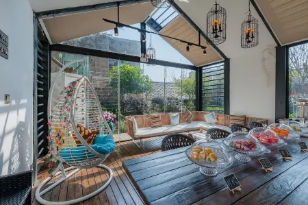 Jiuzhou Inn Отели рядом с достопримечательностью «Yunfeng Tunpu Scenic Area»