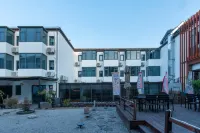 Shanghai Jingxin Guiwo Hotel (Baoshan Temple Branch) Отели рядом с достопримечательностью «Старый город Лонг»